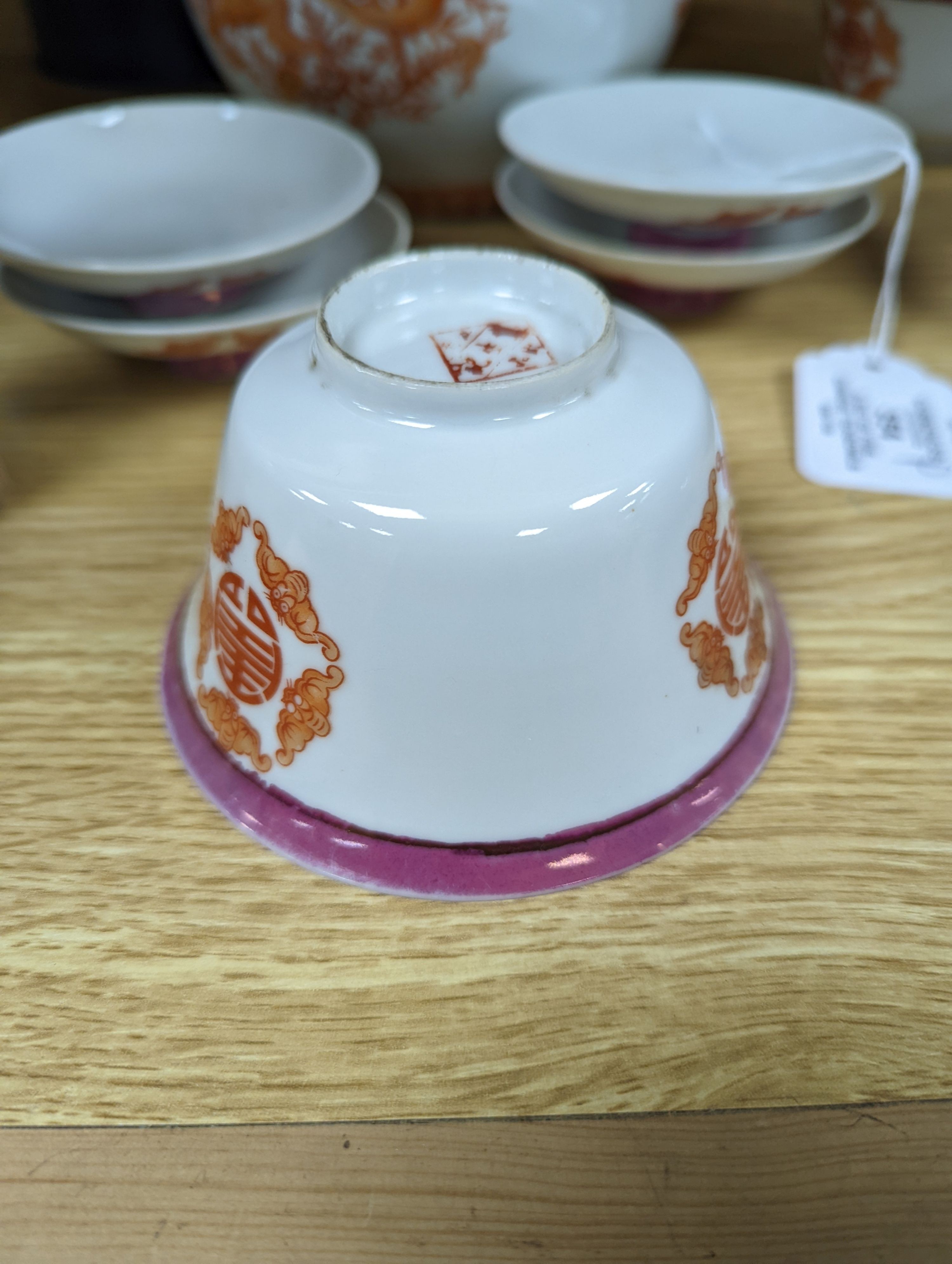 A set of five Chinese teabowls, covers and stands and a similar 'dragon' vase, 23cm